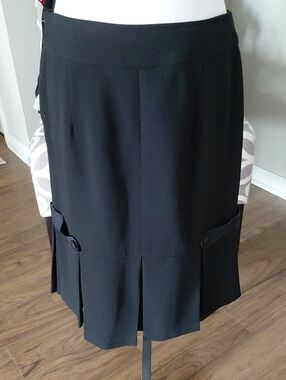 Mark Shale Classic Black Midi Skirt with Pleat and Button Tab Accents